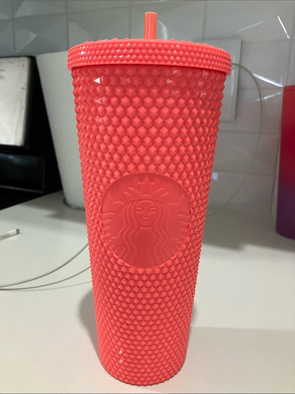 24 ounces / 710 ml Starbucks Coral Textured Studded plastic Tumbler with Straw